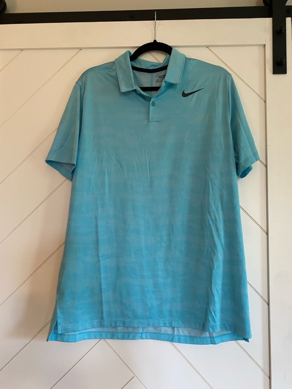 Nike Men’s Aqua Blue Polo Shirt with Black Swoosh